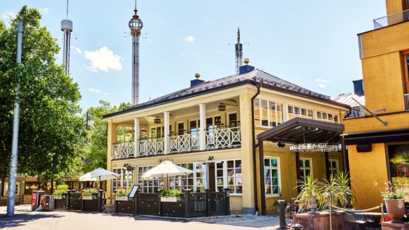 Backstage Villa seen from the street, Gröna Lund amusement park in the background.